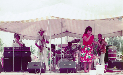 Roy Rendahl playing bass with The Barb Timm Band for an outdoor festival in Winona, Minnesota in 1983